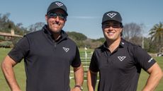 Michael La Sasso with Phil Mickelson after signing for LIV Golf