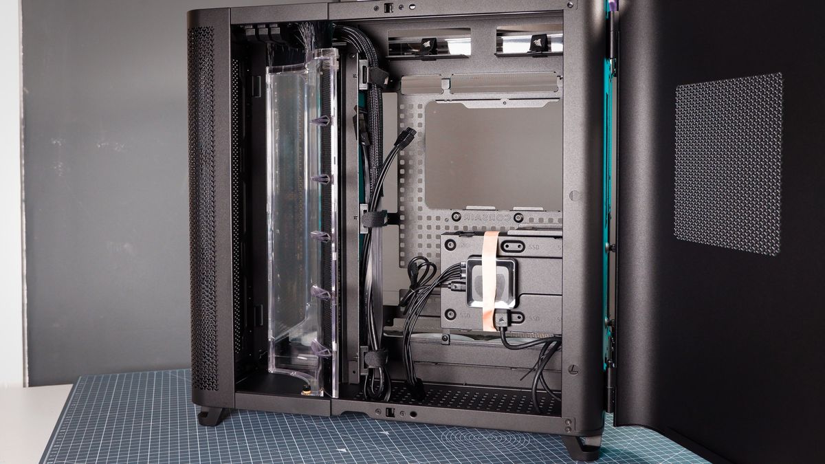 A Corsair Air 5400 PC case on a desk with various parts installed.