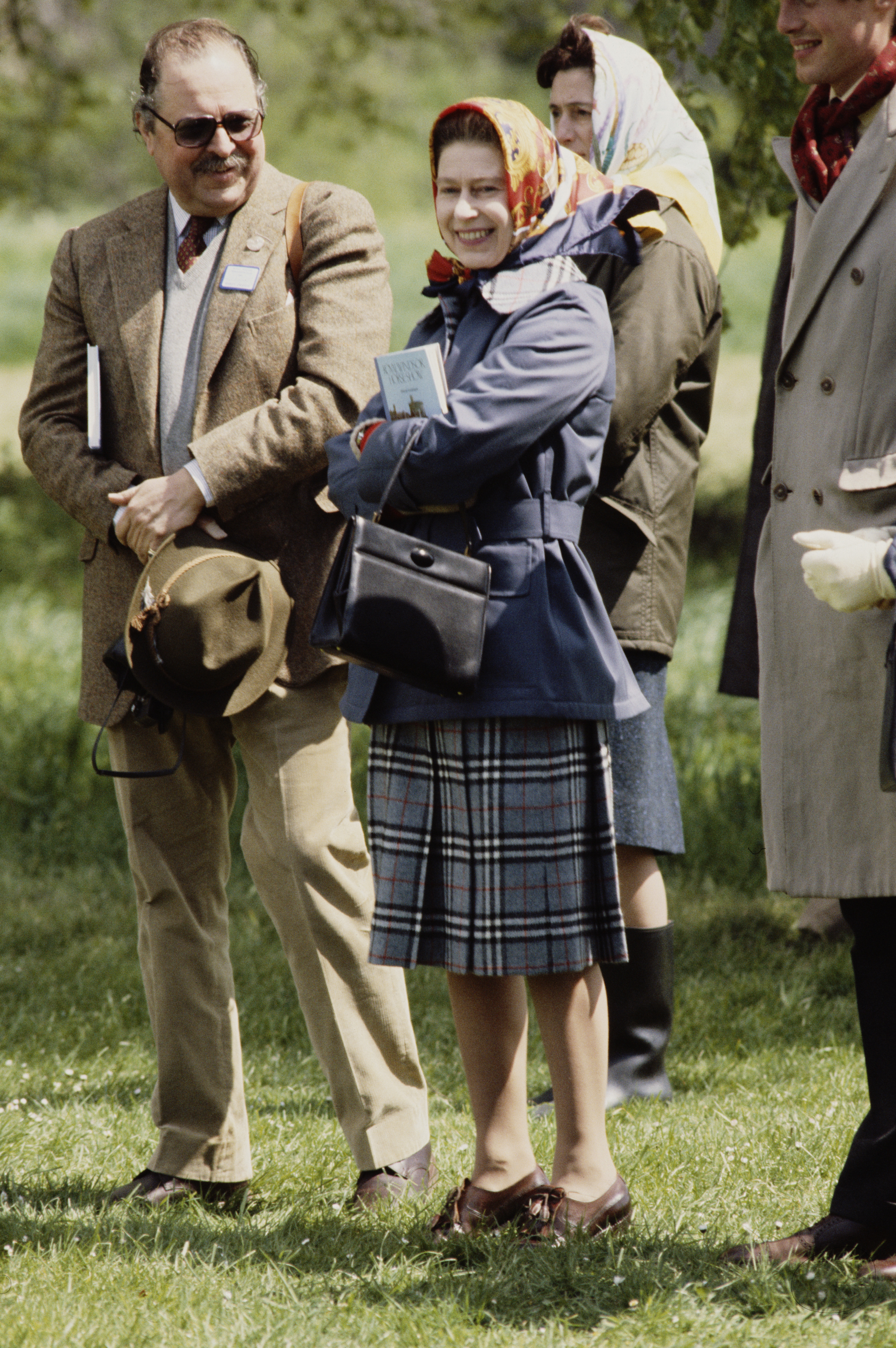 An image of Queen Elizabeth II wearing a country jacket in 1977.