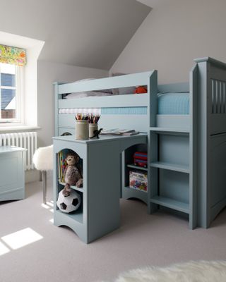 A children's bedroom with a blue bunk bed with inbuilt storage