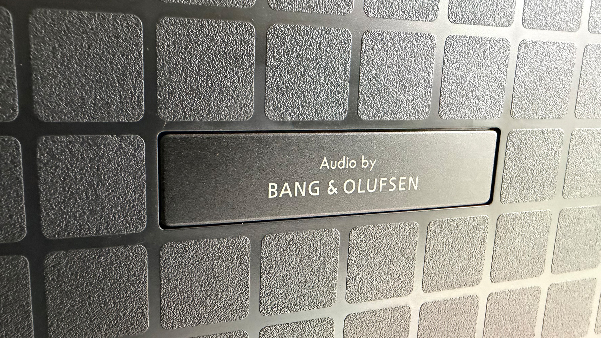 TCL C7L Mini LED TV back of set showing Audio by BANG &amp;amp; OLUFSEN plaque