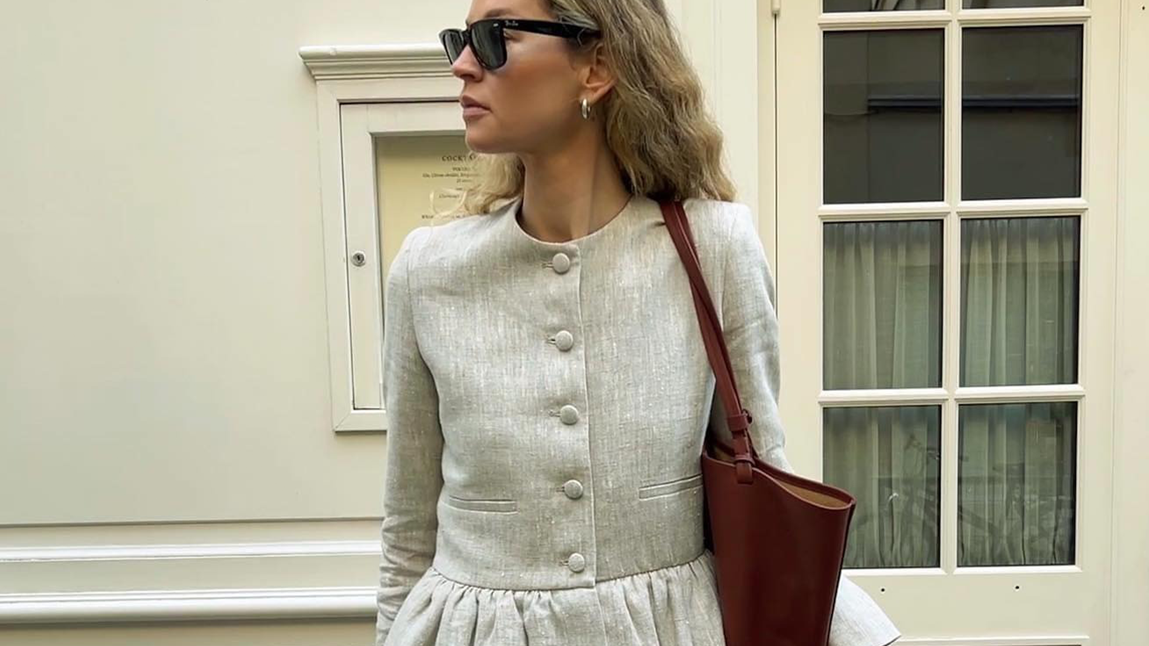 Woman wearing Liberowe peplum top in spring 2026.