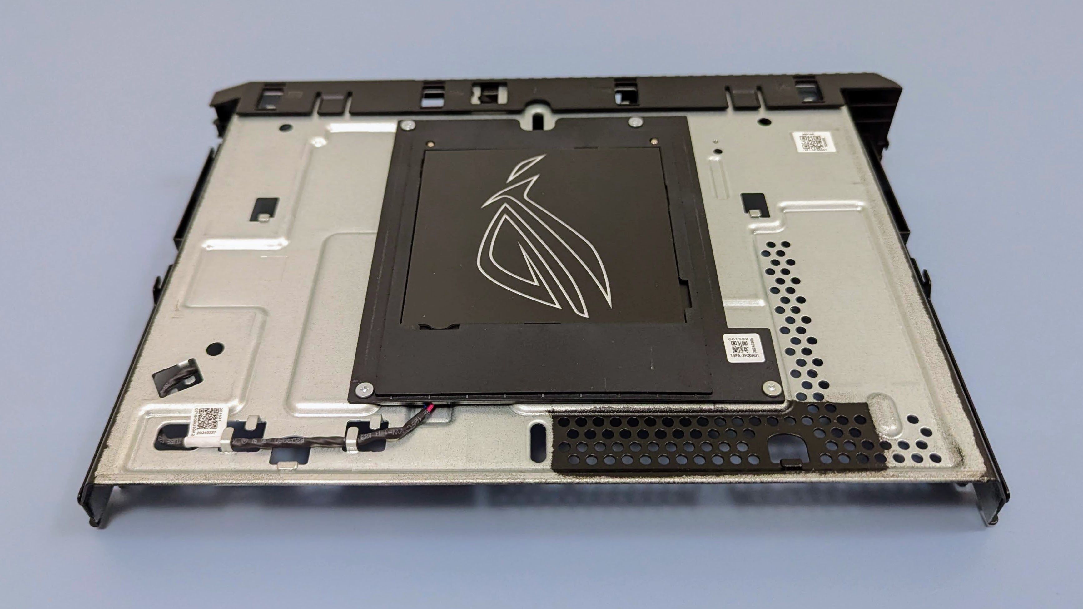 Asus ROG NUC 970 internal cover plate with logo