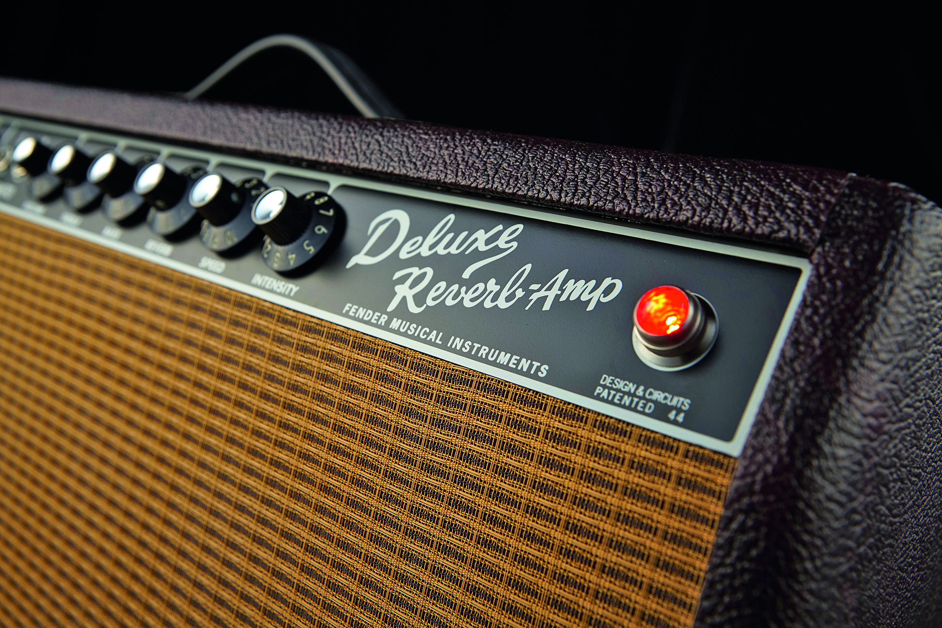 The front control panel of a Fender Deluxe Reverb amplifier