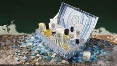 A summer advent calendar with three candles, a solid fragrance balm, fragrance oils and lotions from Diptyque