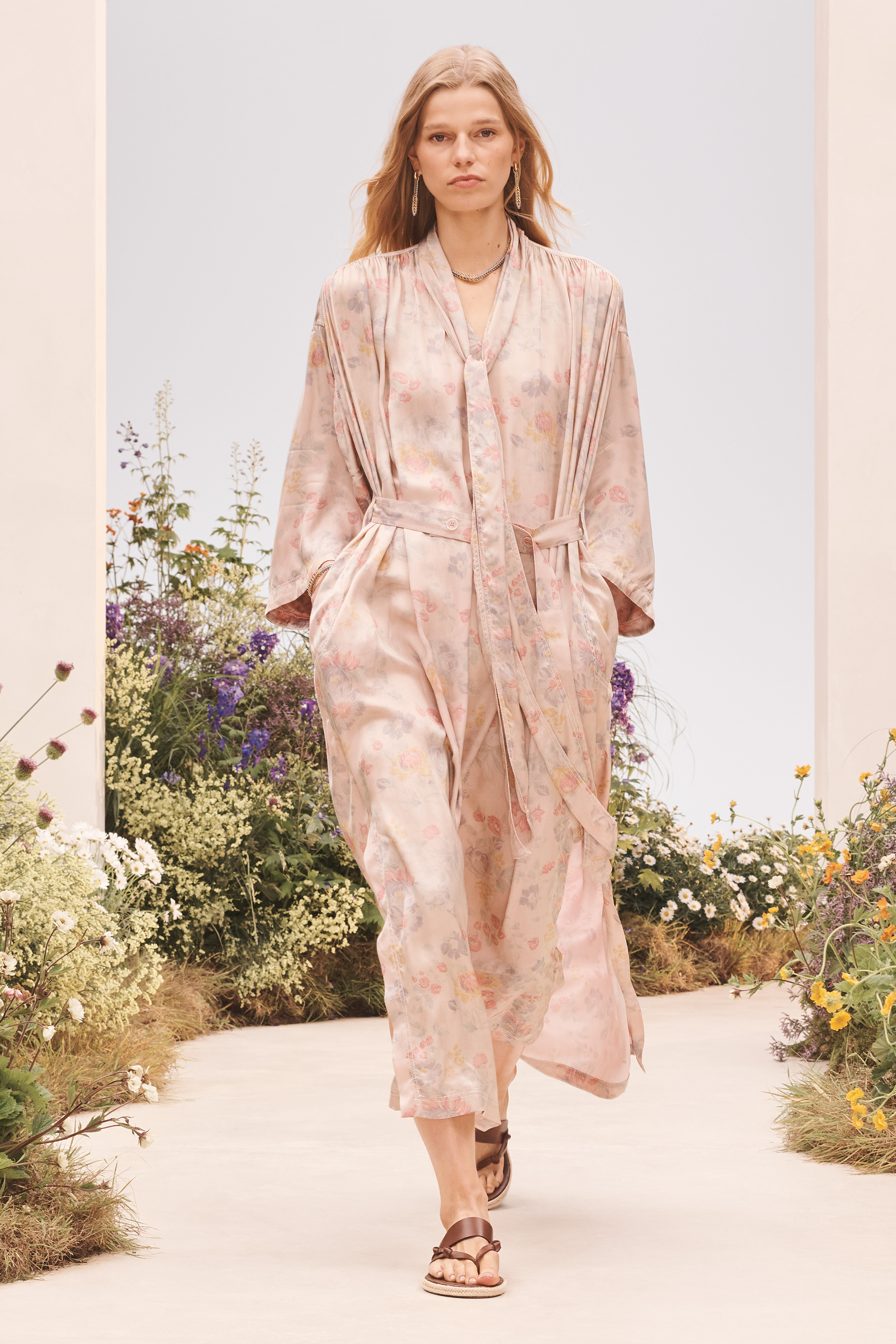 A model wearing a dress for the Zara SRPLS collection