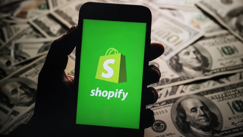 A shopify logo on a phone