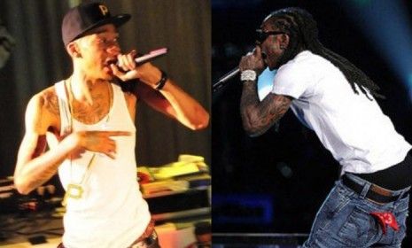 The game between Pittsburgh and Green Bay has spurred a battle of beats and rhymes between Steelers fan Wiz Khalifa (left) and Packers fan Lil Wayne (right).