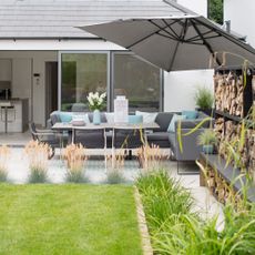 outdoor area with garden and sofa