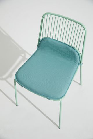 Cushioned seat of the mint green garden chair by Benjamin Hubert for Allermuir
