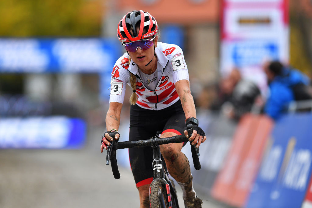 OVERIJSE BELGIUM OCTOBER 31 Denise Betsema of The Netherlands and Team Pauwels Sauzen Bingoal crosses the finishing line during the 62nd Druivencross Overijse UCI CycloCross Worldcup 2021 Womens Elite DruivencrossOverijse CXWorldCup UCIcyclocrossWC on October 31 2021 in Overijse Belgium Photo by Luc ClaessenGetty Images