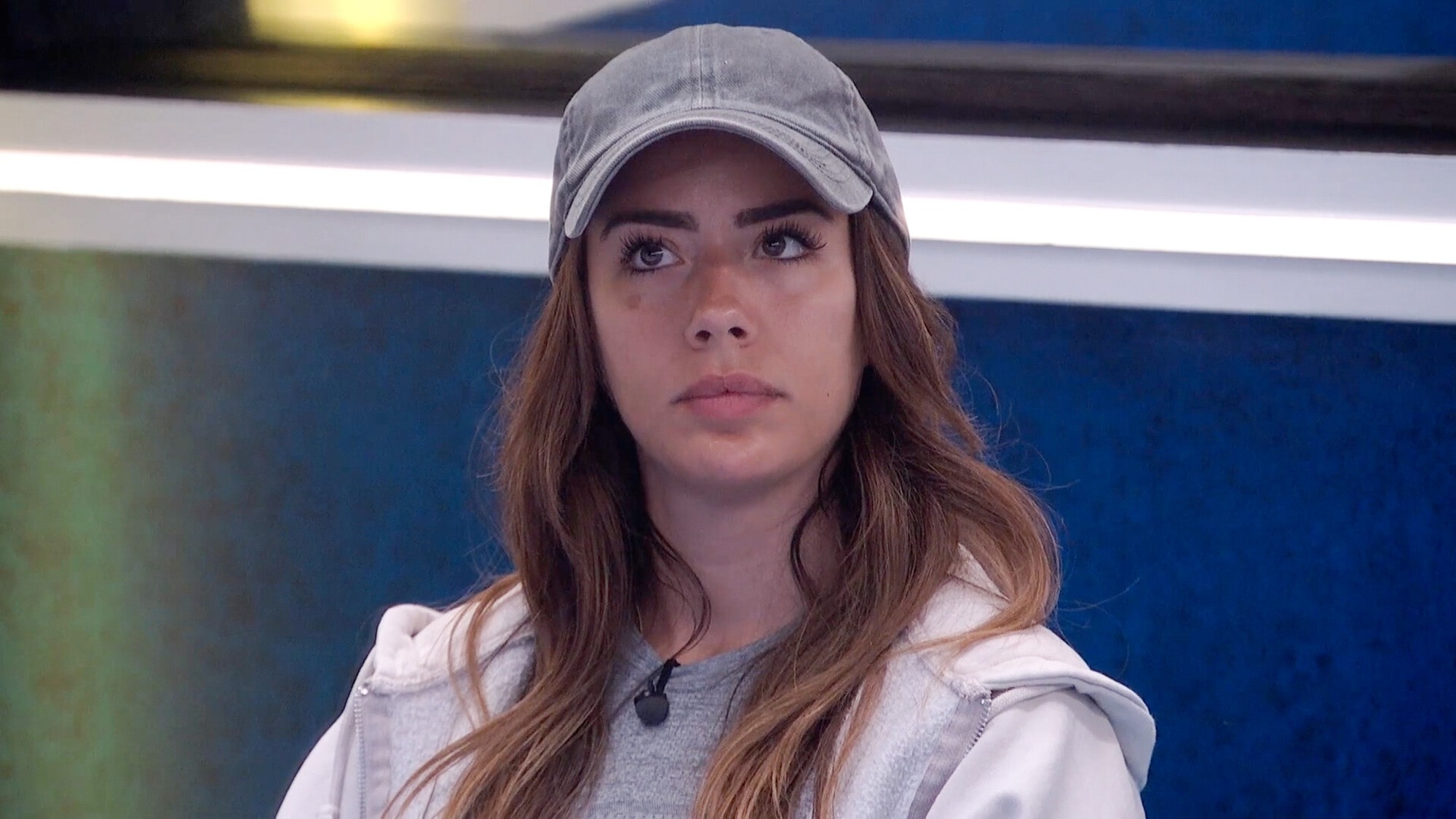 Dee with a serious look on her face.