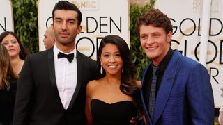 (L-R) Actors Justin Baldoni, Gina Rodriguez and Brett Dier attend the 72nd Annual Golden Globe Awards at The Beverly Hilton Hotel on January 11, 2015 in Beverly Hills, California. 