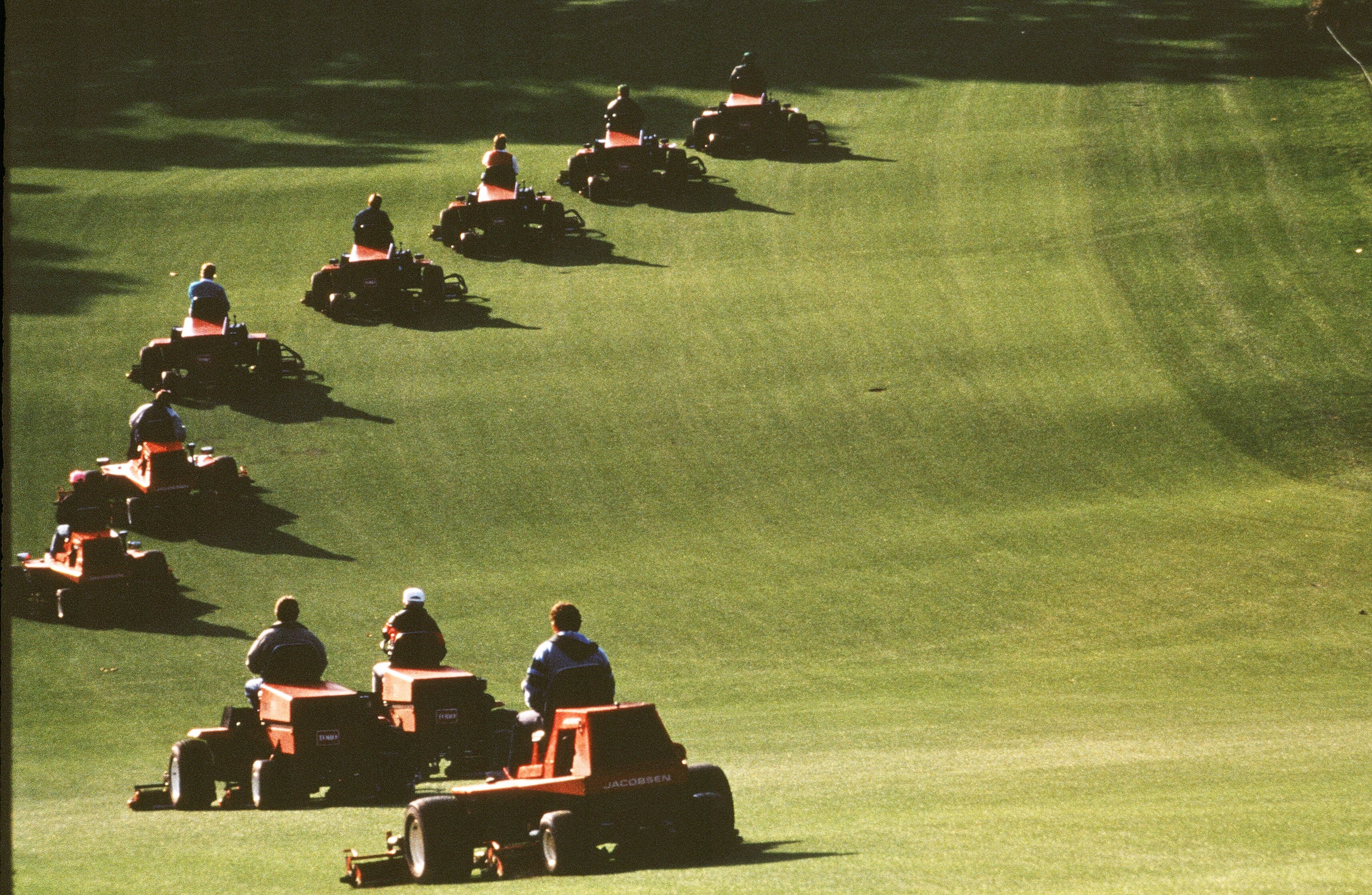 Golf Course Staff Mows Course In 1990