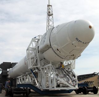 Falcon 9 Rocket and Dragon Spacecraft Rolling to Launch Pad 5-12