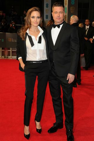 Brad Pitt and Angelina Jolies wear matching tuxedos at the BAFTAs red carpet 2014.