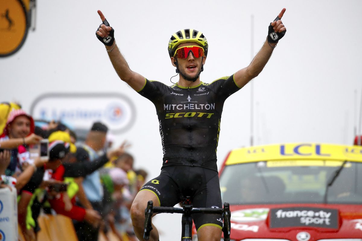 Simon Yates celebrates his stage win