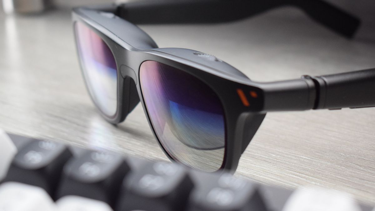 Photo of VITURE Pro XR Glasses Chromatic lenses with Keychron Q1 HE keyboard in foreground.