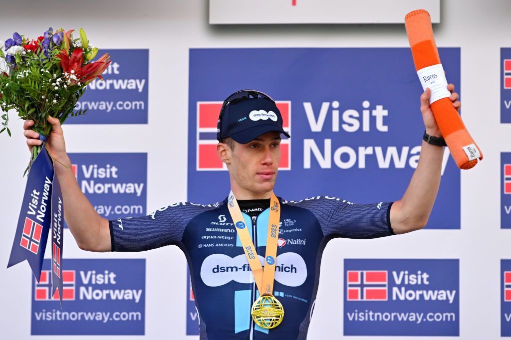 ALTA NORWAY AUGUST 17 Alberto Dainese of Italy and Team DSMFirmenich celebrates at podium as stage winner during the 10th Arctic Race of Norway Stage 1 a 171km stage from Kautokeino to Alta UCIWT on August 17 2023 in Alta Norway Photo by Luc ClaessenGetty Images