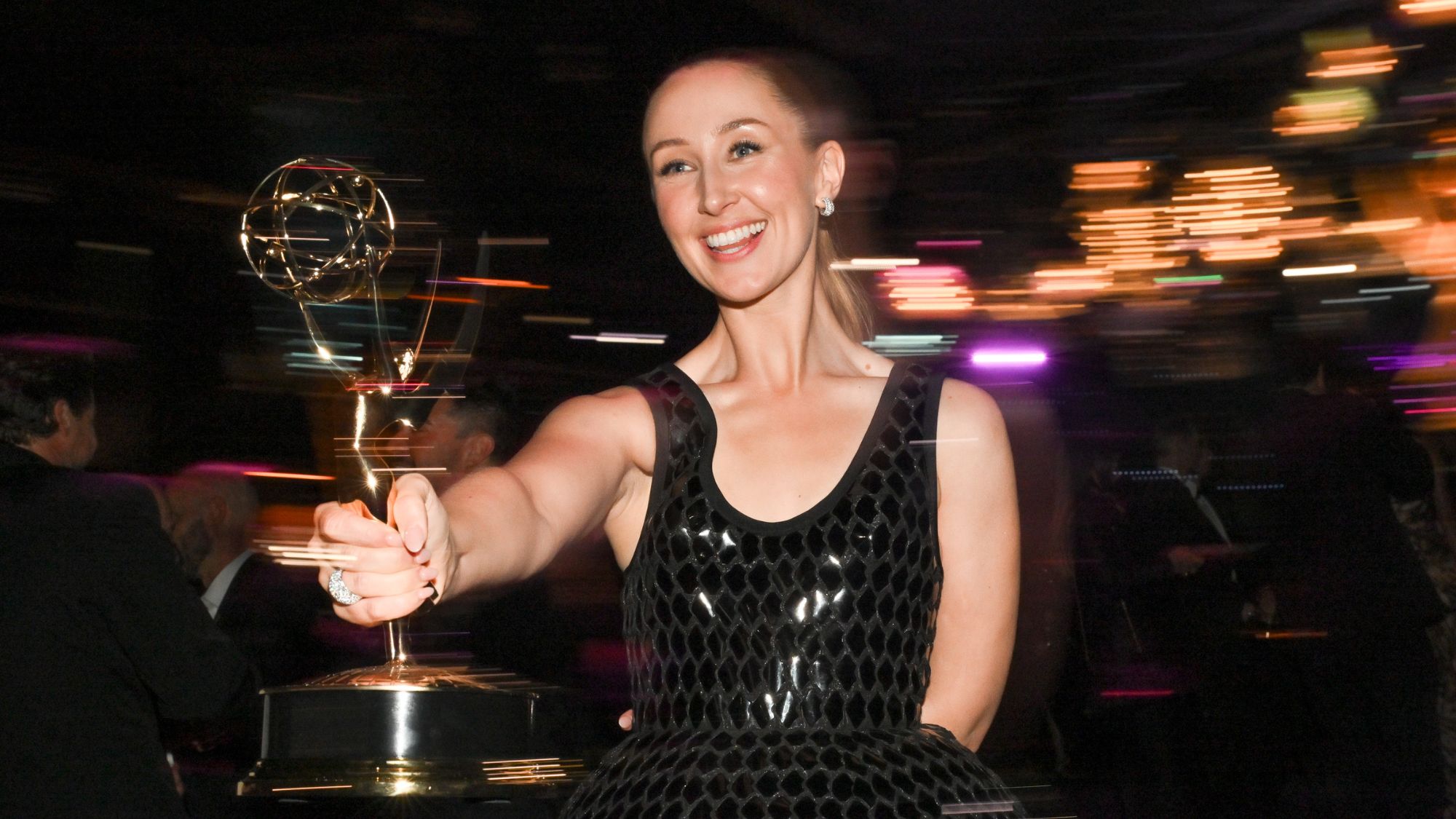 Erin Doherty celebrates her win at the 2025 Emmy Awards