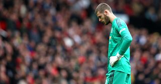 Manchester United goalkeeper David De Gea looks dejected during the Premier League match between Manchester United and Chelsea FC at Old Trafford on April 28, 2019 in Manchester, United Kingdom.