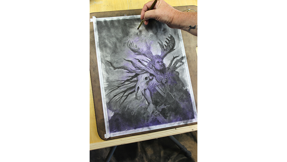Image of a charcoal abstract character art in progress