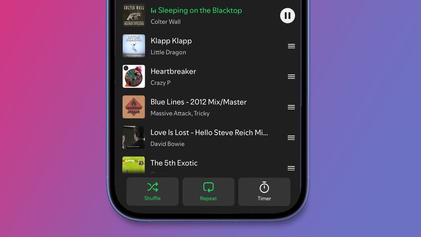 A phone on a pink and blue background showing the Spotify app&#039;s Queue in the Now Playing view