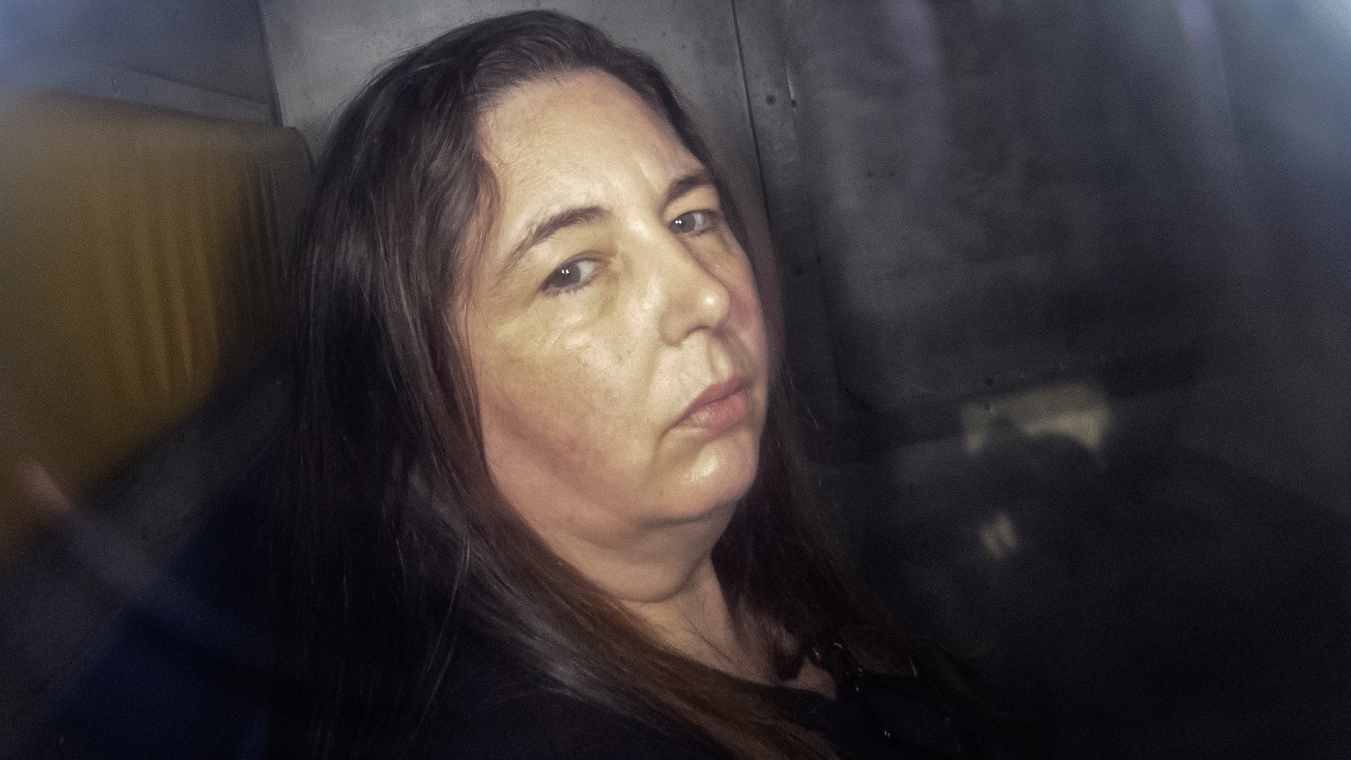 Erin Patterson pictured in a prison vehicle in at Latrobe Valley Magistrate's Court in Morwell, Australia, in May
