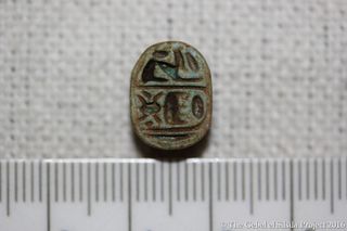 A scarab bearing the cartouche of the pharaoh Thutmose III from Egypt's 18th Dynasty, discovered at Gebel el Silsila in Upper Egypt.