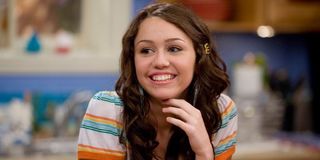 Miley Cyrus as Miley Stewart in Hannah Montana.