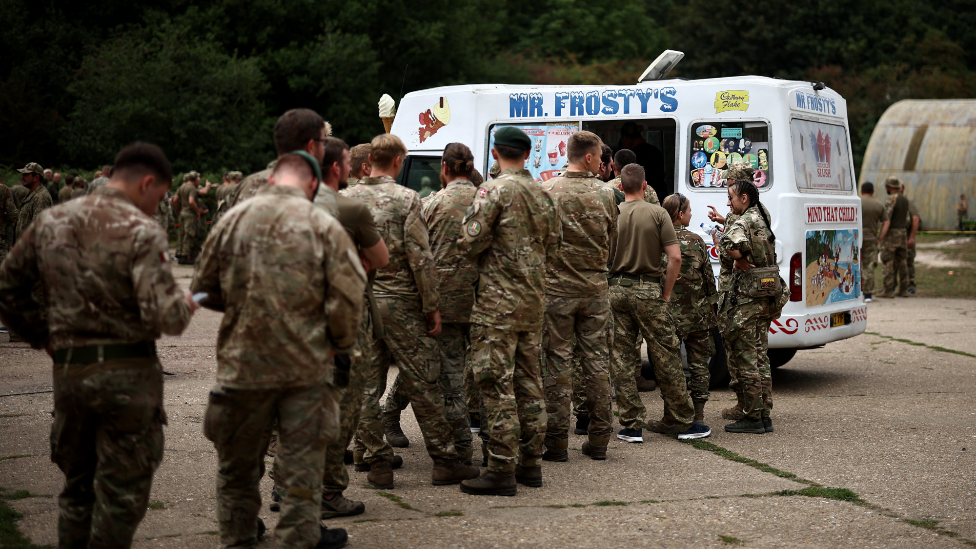 Soldiers line up at an ice cream truck