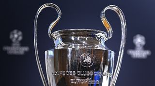 The Champions League trophy on show ahead of the draw for the last 16 in December 2023.
