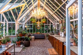 greenhouse used as an outdoor living room space