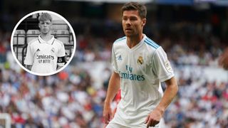 Xabi Alonso playing for Real Madrid at the Bernabeu against Arsenal with Marc Cucalon there also