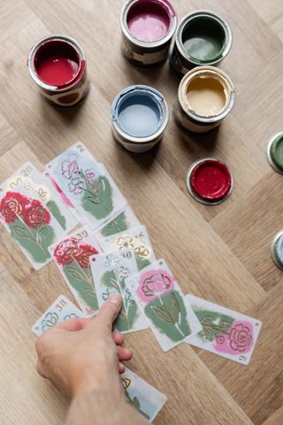 Used floral stencils and paint tester pots