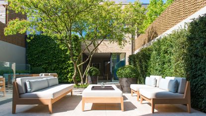 An outdoor area with backyard furniture