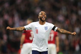 Raheem Sterling celebrates after scoring a hat-trick for England against Czech Republic in March 2019.