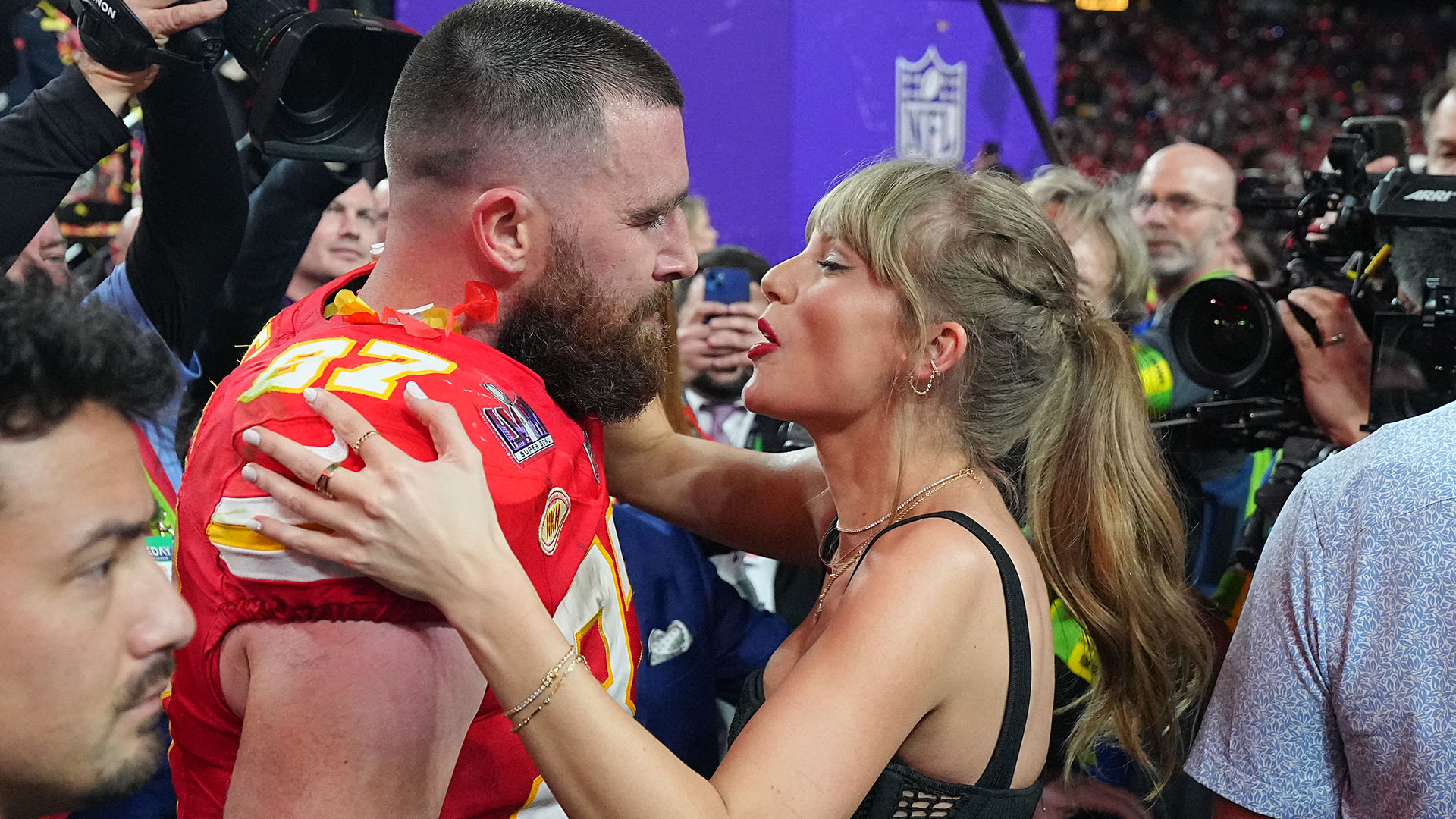 Travis Kelce and Taylor Swift celebrating the Kansas City Chiefs' Super Bowl win