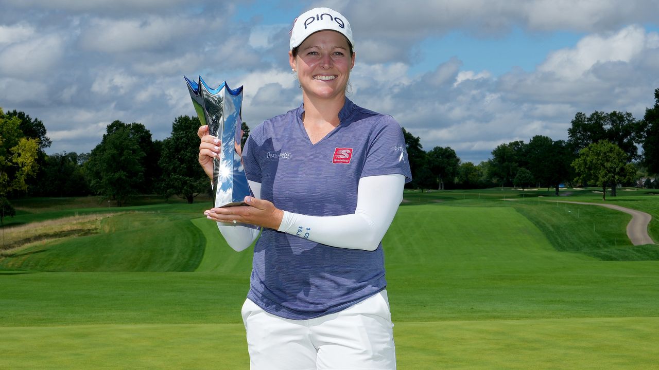 Ally Ewing holds the trophy after she won the 2022 Queen City Championship in Ohio