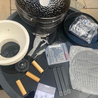 Tower Kamado Maxi Charcoal BBQ in pieces on Louises garden table unboxed