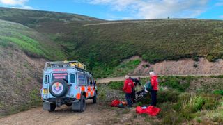 Tweed Valley Mountain Rescue Team attending to an injured mountain biker