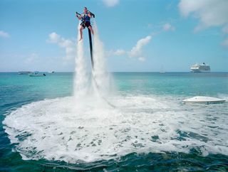 Woods and Galimberti photographed an employee of Jetpack Cayman demonstrating the watersport