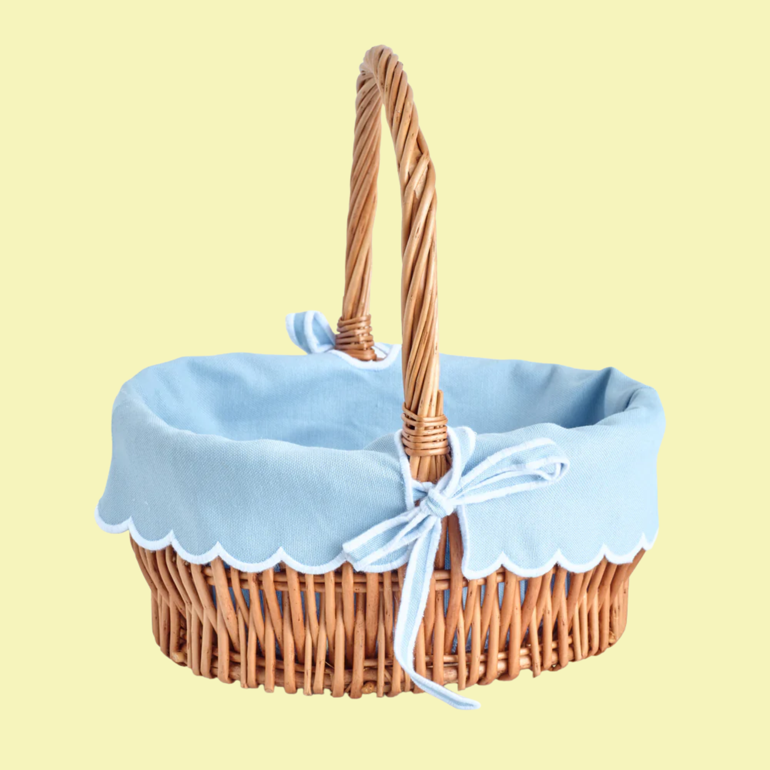 A woven Easter basket with a blue cover