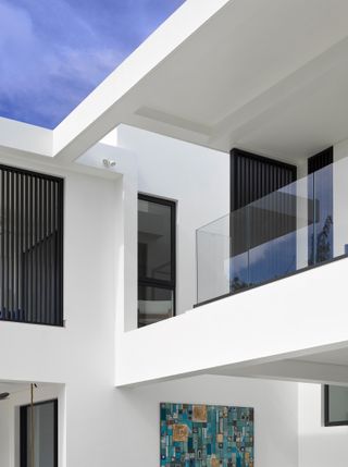 detail of white exterior and volumes at Polo Villa by Elements Architecture, Barbados