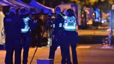Vancouver police investigate a crime scene after a man drove into pedestrians at the annual Lapu Lapu festival celebrating Filipino culture