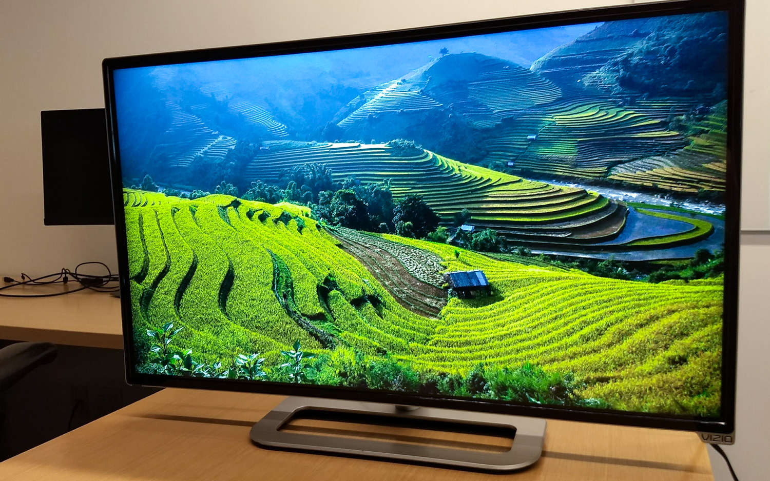 Google Chromecast hides behind stylish TVs and desktop wallpapers