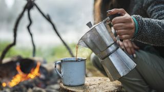 how to make coffee while camping: pouring coffee