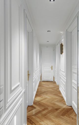 white hallway with herringbone flooring