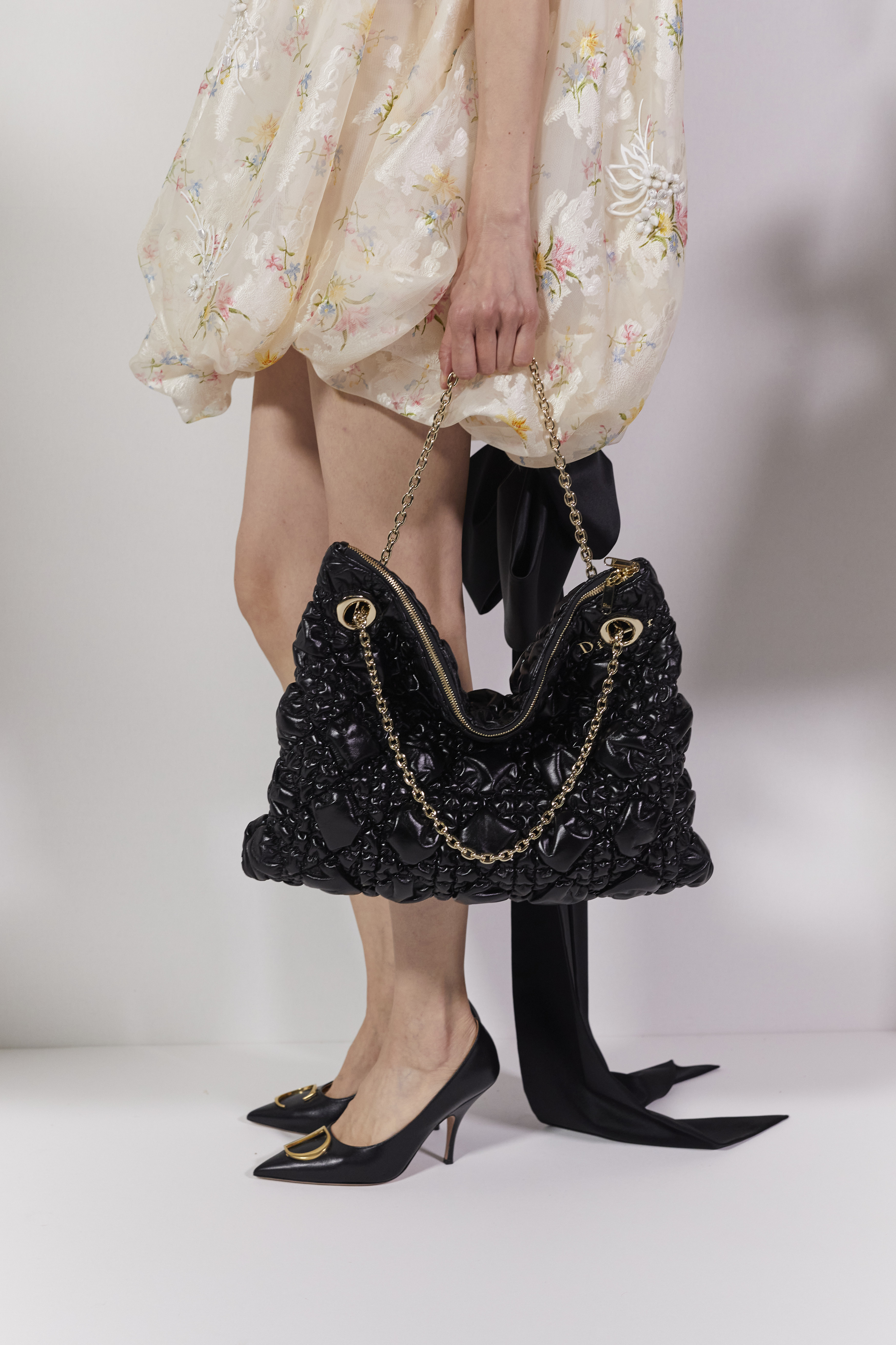 close ups of models at Dior wearing Jonathan Anderson&#039;s shoes and bags for Dior