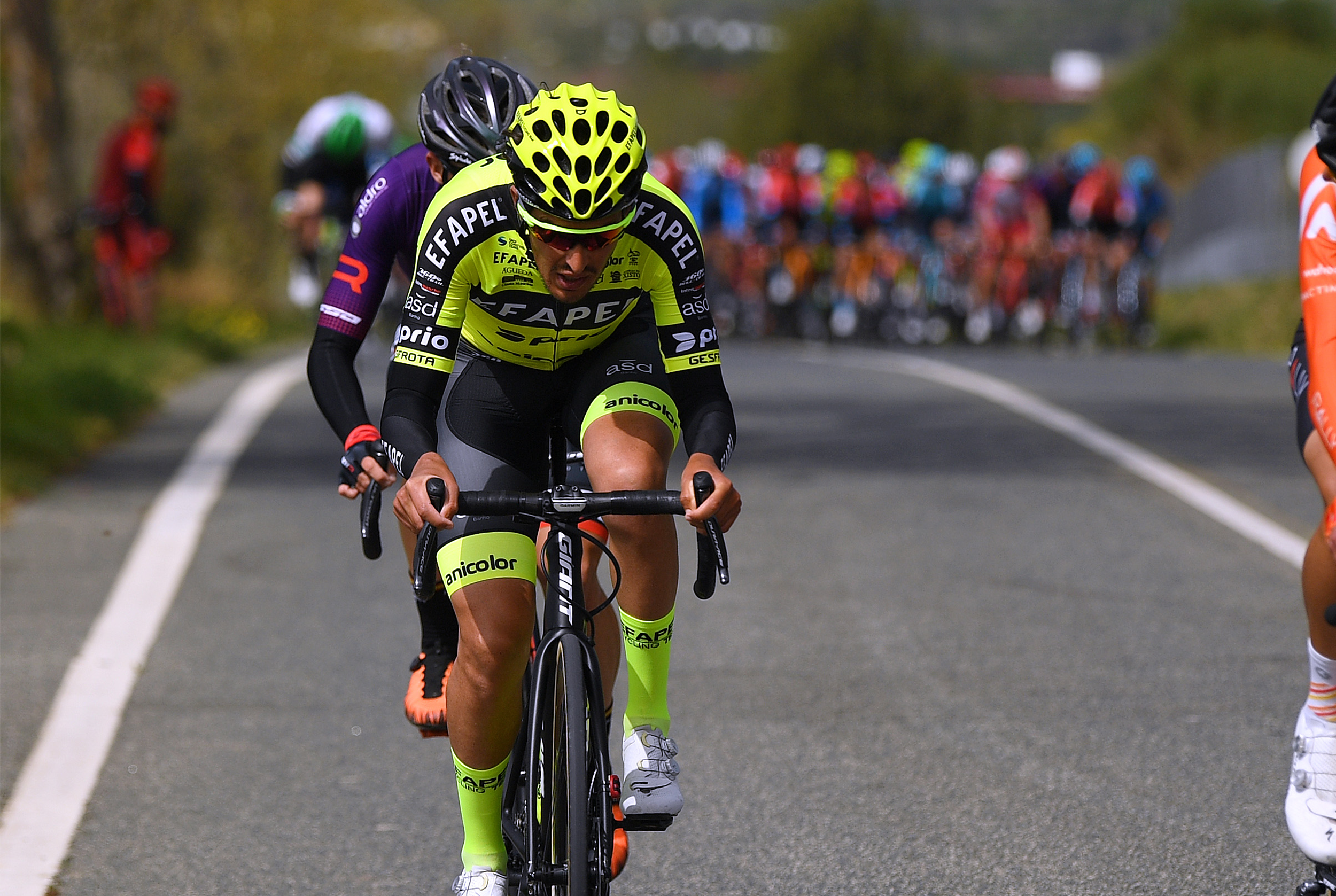 Ant&oacute;nio Carvalho Ferreira, in neon yellow, riding in 2021